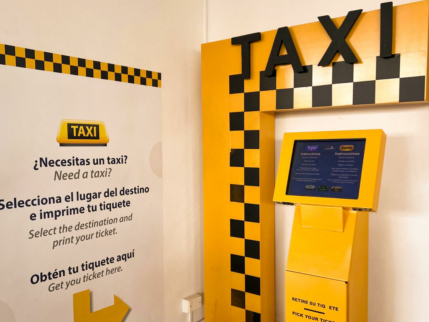 The taxi ordering ticket stand at the Cartagena airport 
