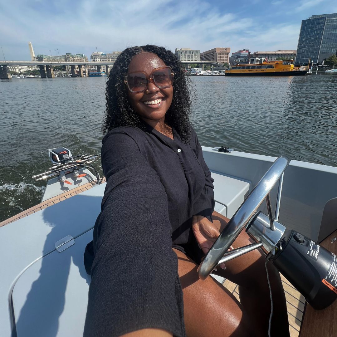 Christina Jane driving a boat at The Wharf 