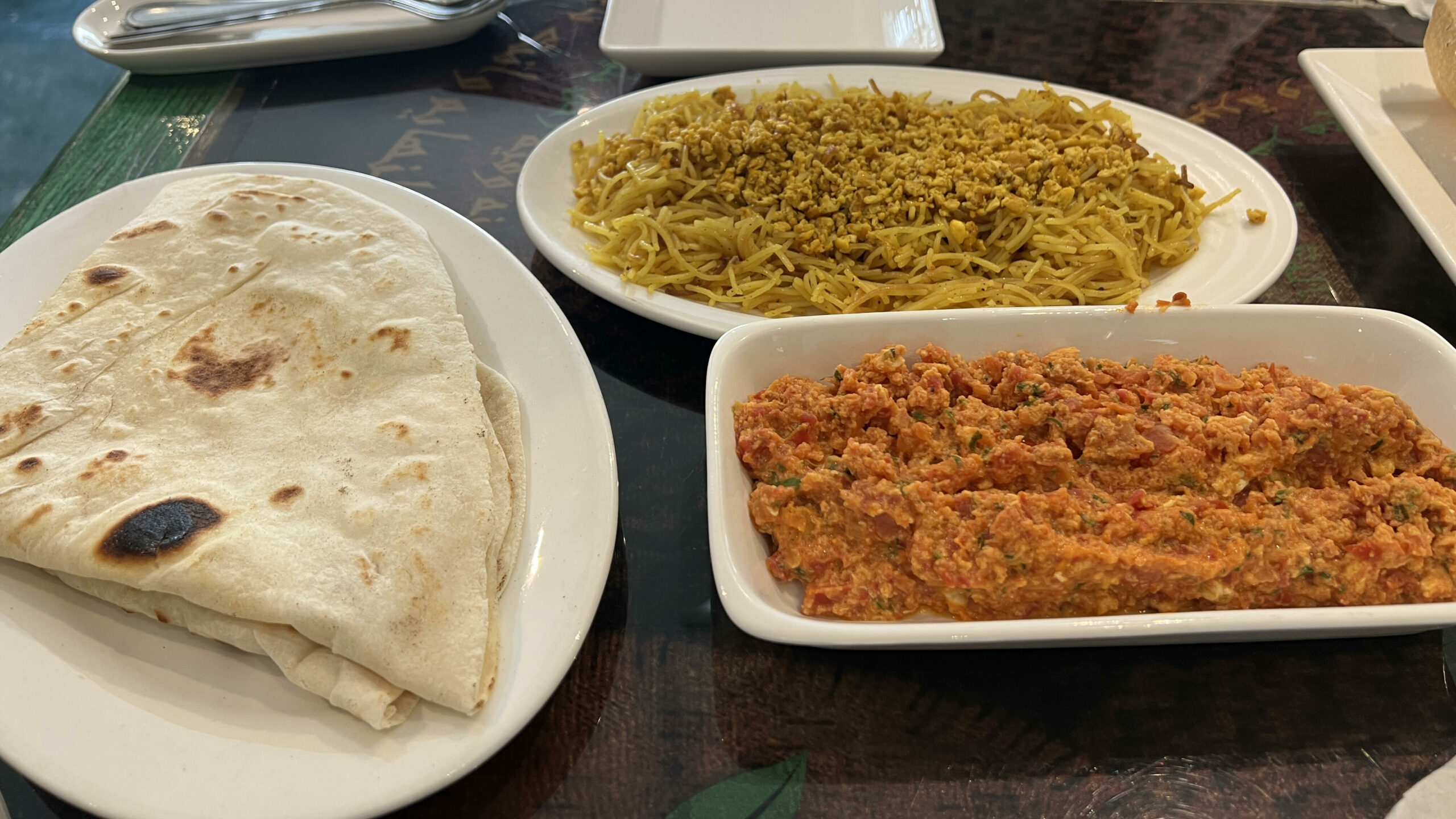 A spread of traditional breakfast food in Qatar 