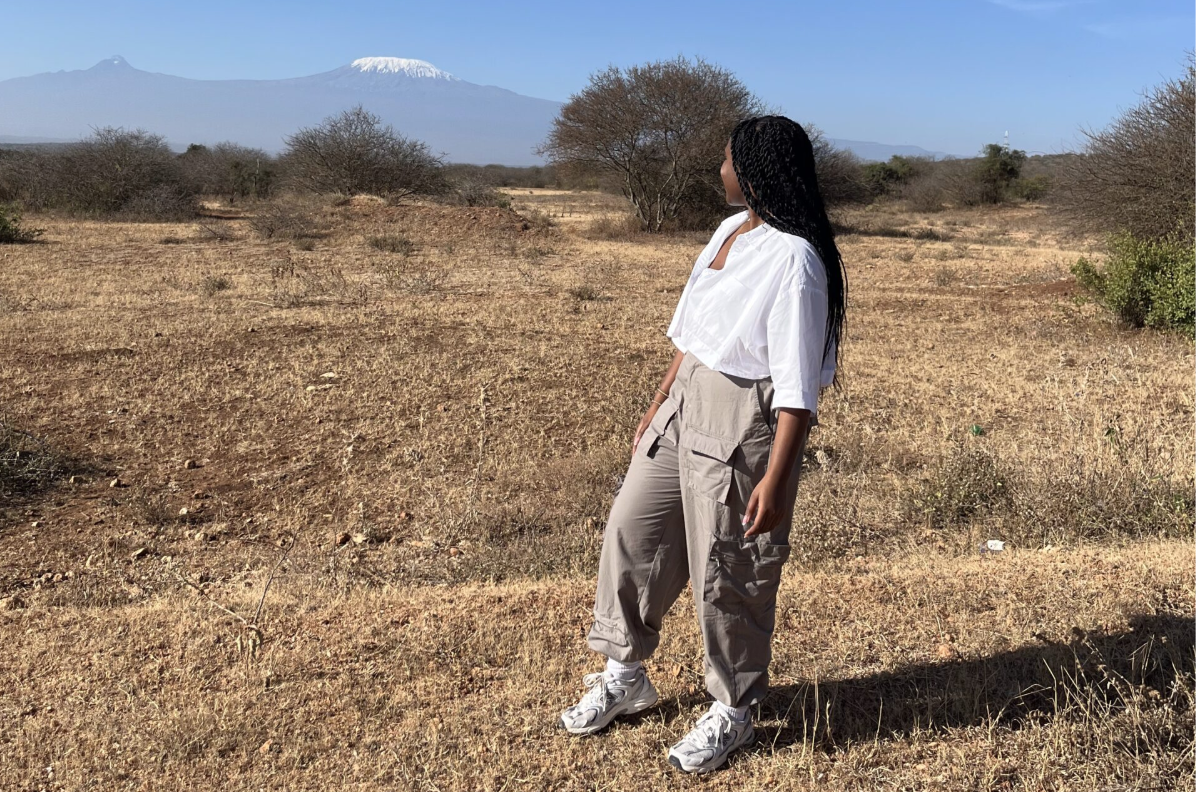 Christina Jane in front of Mount Kilimanjaro